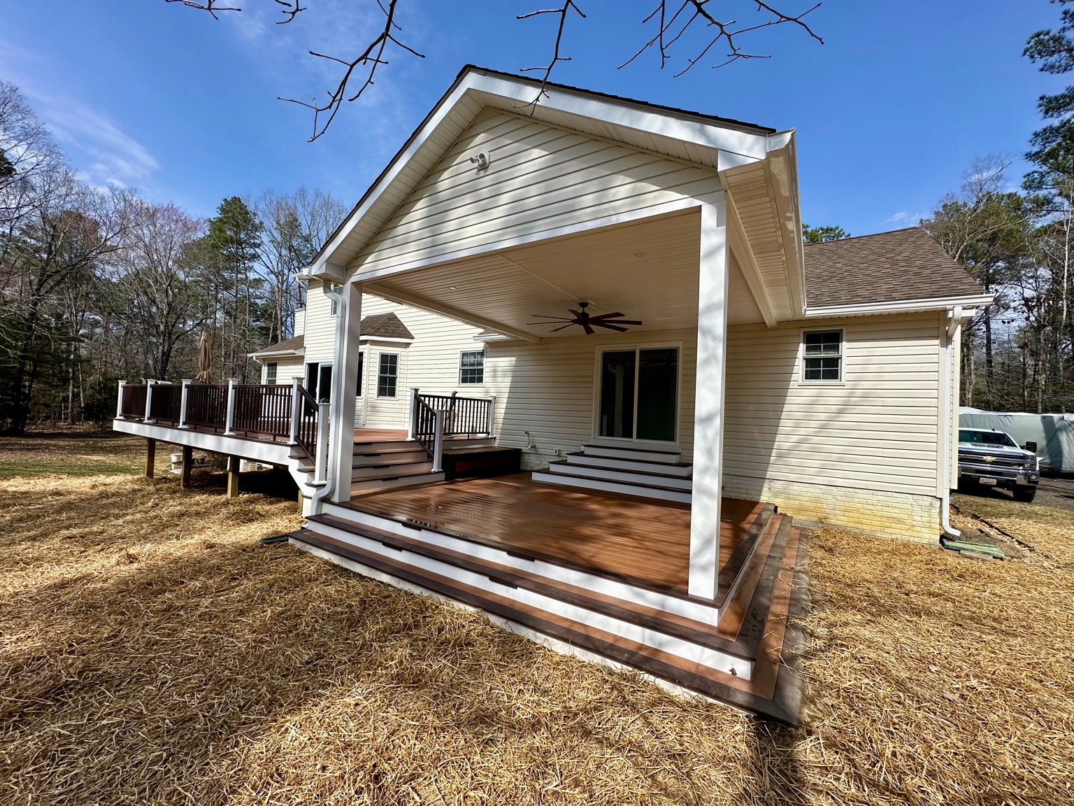 After — completed deck and covered porch