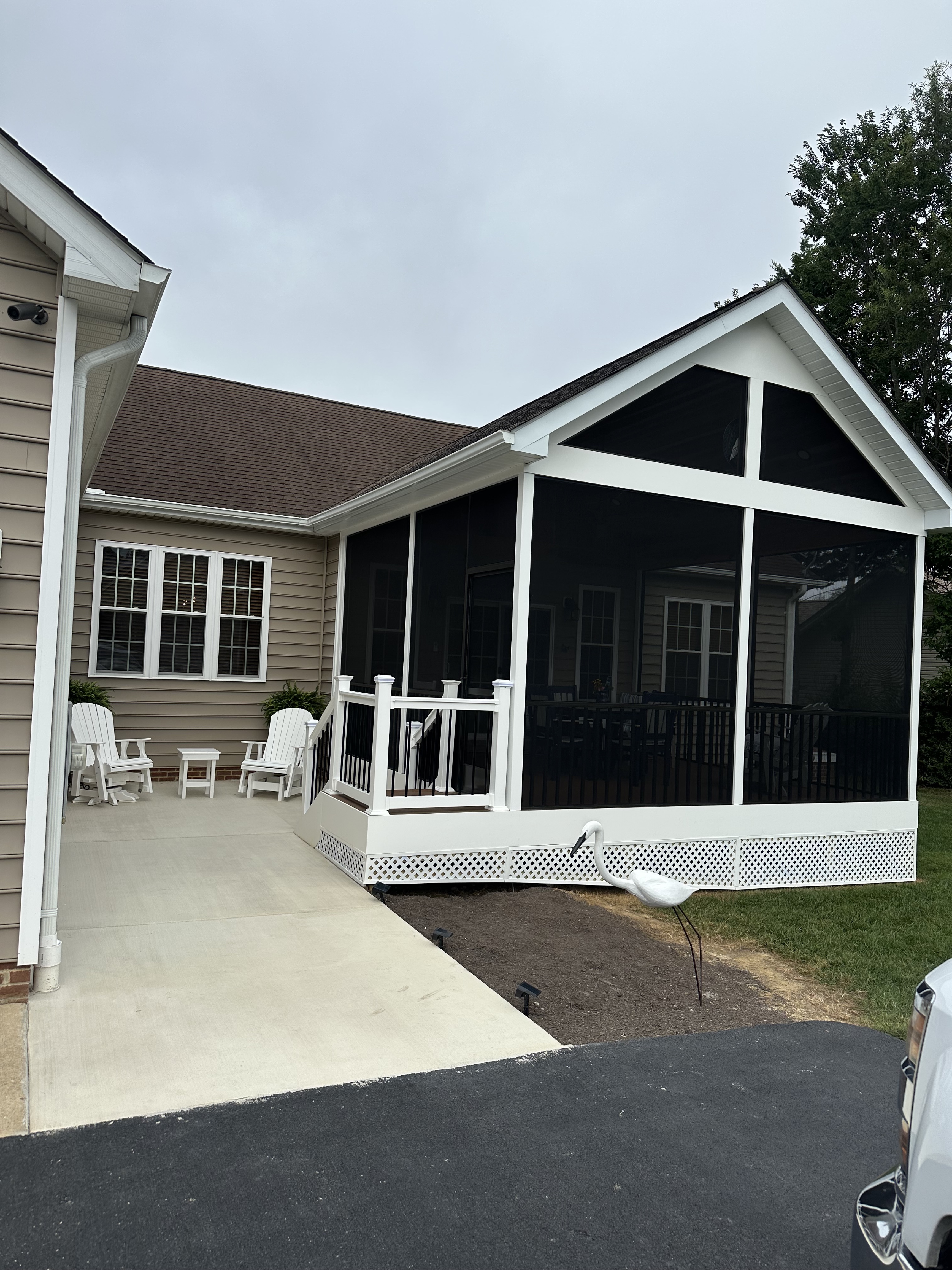 After — screened porch from driveway approach