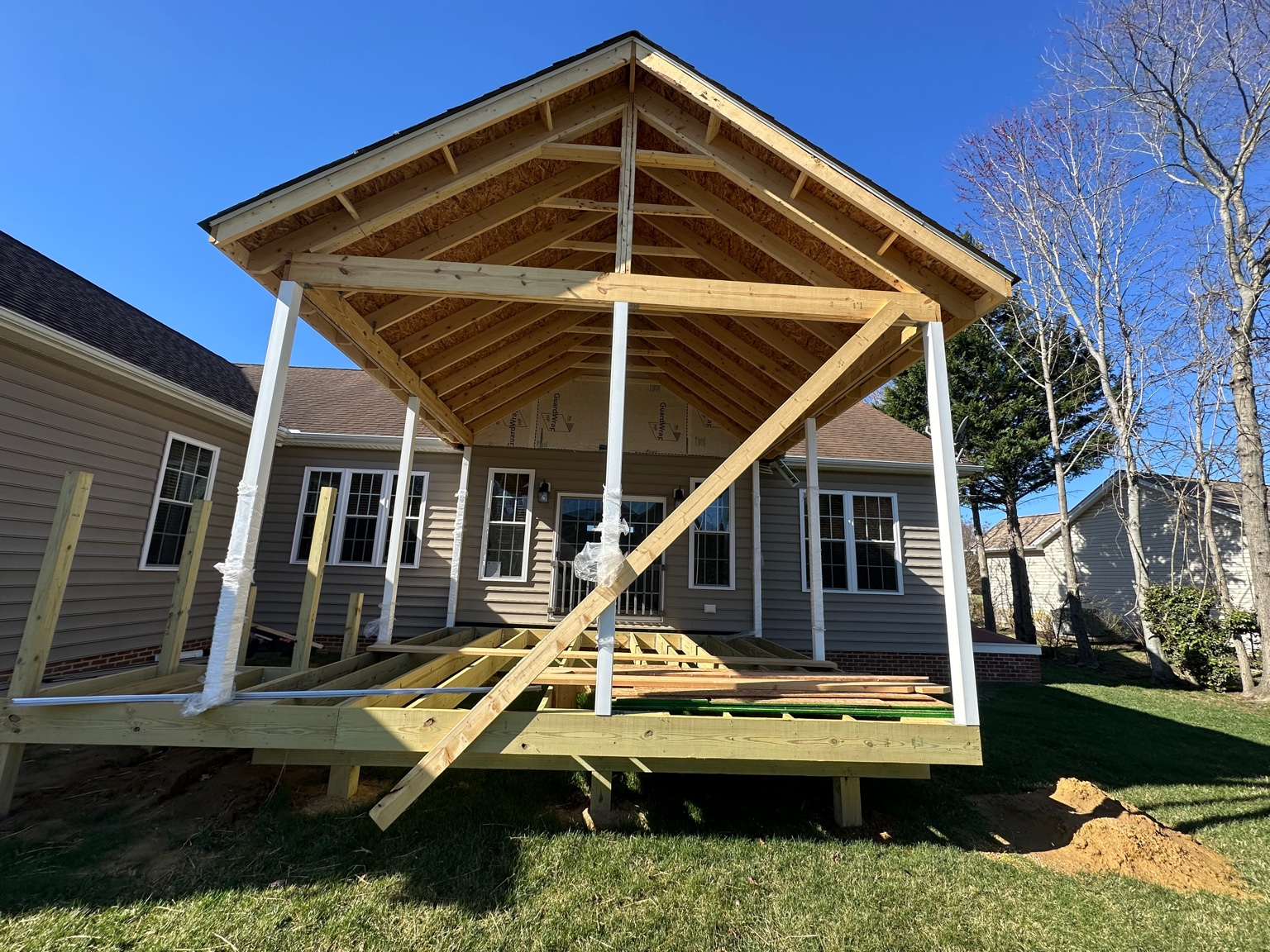 During — porch framing and roof structure